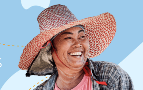 women in a hat smiles